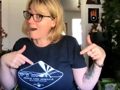 AmyJune pictured wearing her dark blue Drupal Camp Asheville 10th anniversary t-shirt